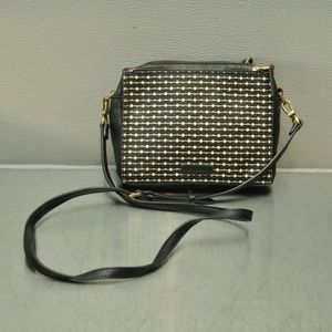 Fossil leather with coated canvas crossbody bag